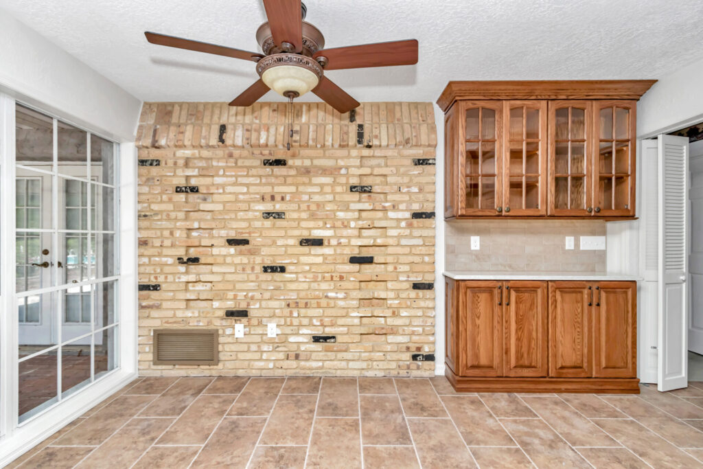 after home renovation - eat-in kitchen with added bar