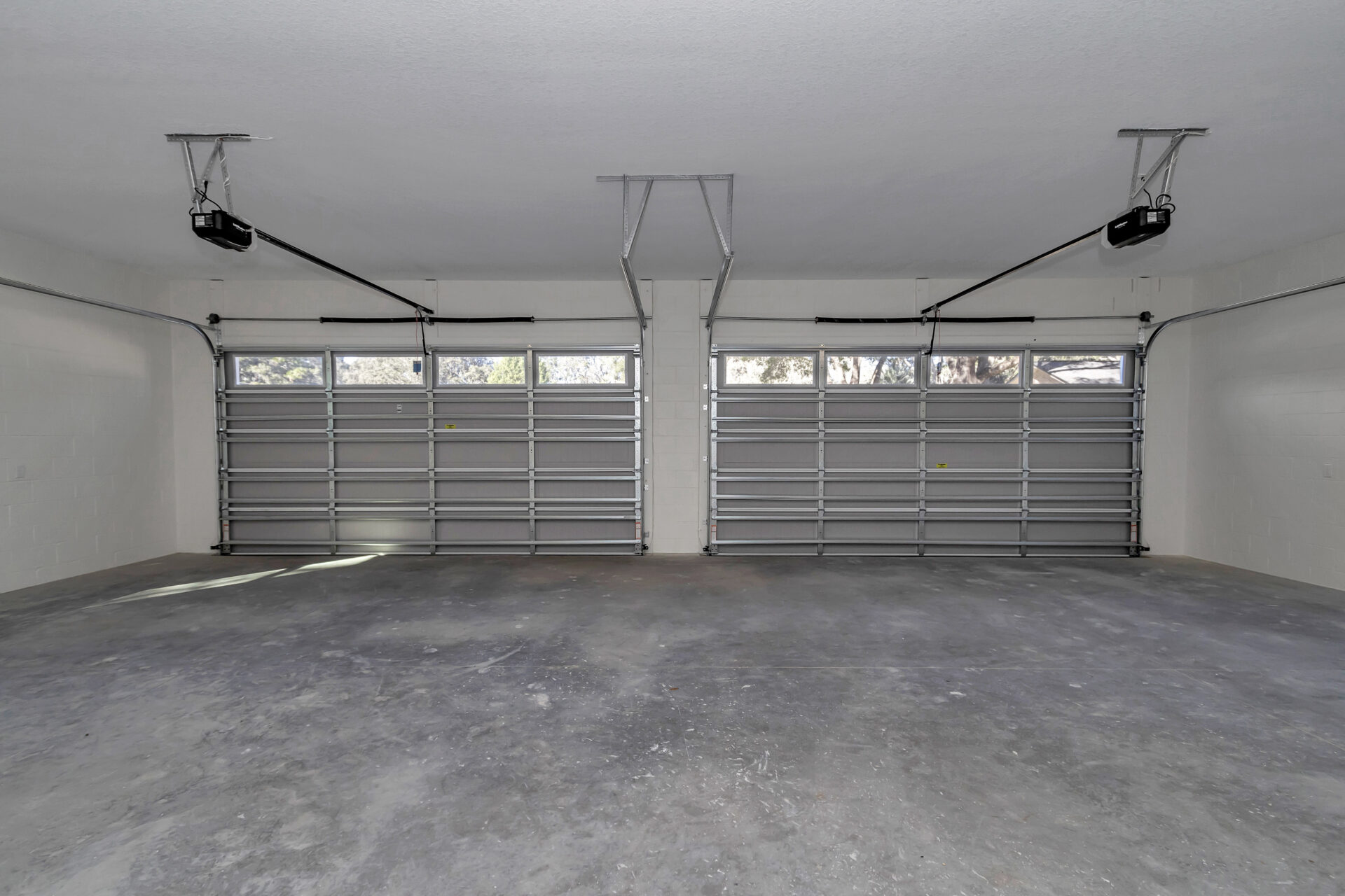 Detailed shot of the internal storage space within the two-bay garage