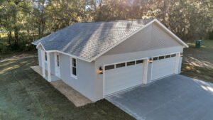 Full view of the building exterior showcasing the distinct garage and office wings