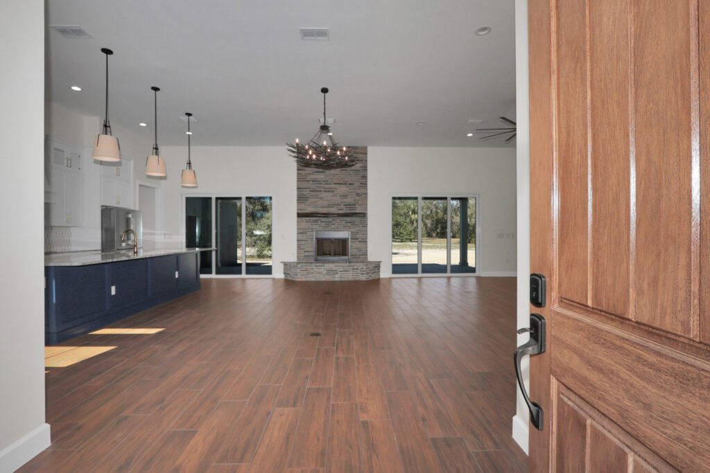 Walk through the front door of this Fort Mccoy Estate and see the open concept floorplan - Custom Home Builder