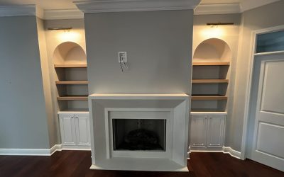 To ensure the new fireplace felt like a permanent part of the home, we used a refined color palette specifically matched to the existing walls.