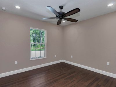 Detailed view of the guest bedroom layout, showcasing consistent design and natural light