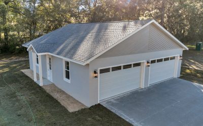 Full view of the building exterior showcasing the distinct garage and office wings