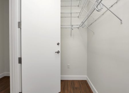 The master suite’s ventilated safe room, engineered for storm protection while providing high-end organization.