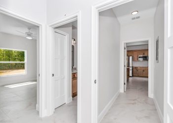 Hallway between bedroom 2, bedroom 3 and the second bathroom