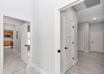 Left- hallway to in law suite right - mudroom, pantry and garage