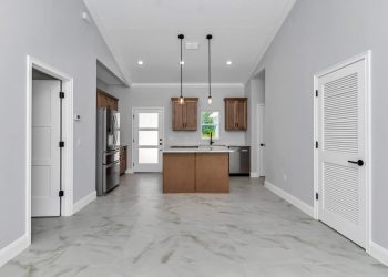 Self-contained living room in the independent apartment of Model 2616, perfect for multi-generational living