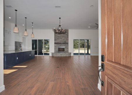 Walk through the front door of this Fort Mccoy Estate and see the open concept floorplan - Custom Home Builder