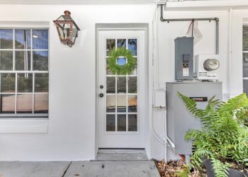 after renovation - updated door with window that walks into the new mud room